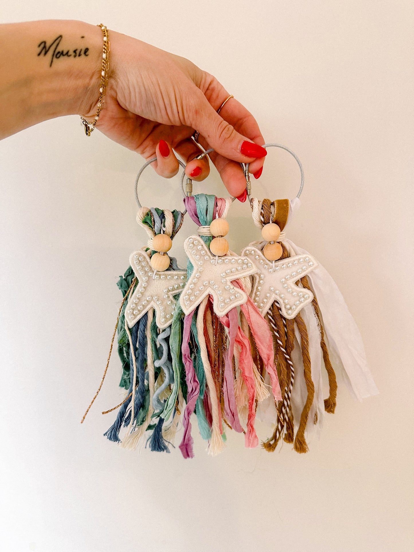 initial bag tassel neutral